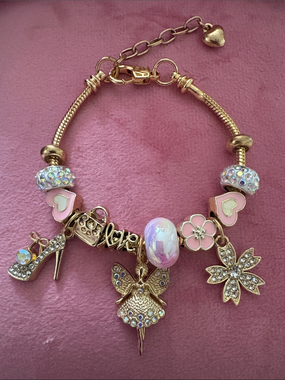 Gold-Tone Pink Charm Bracelet with Crystal Accents